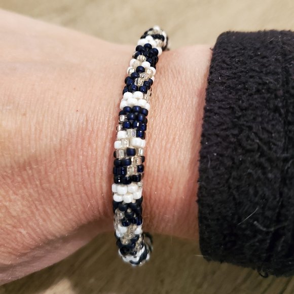 Blue and white glass bead cord bracelet - Picture 2 of 2